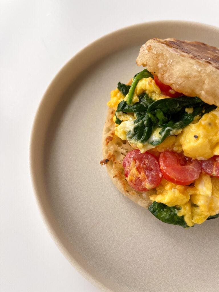 Spinach, Tomato, Egg and Cheddar English Muffin