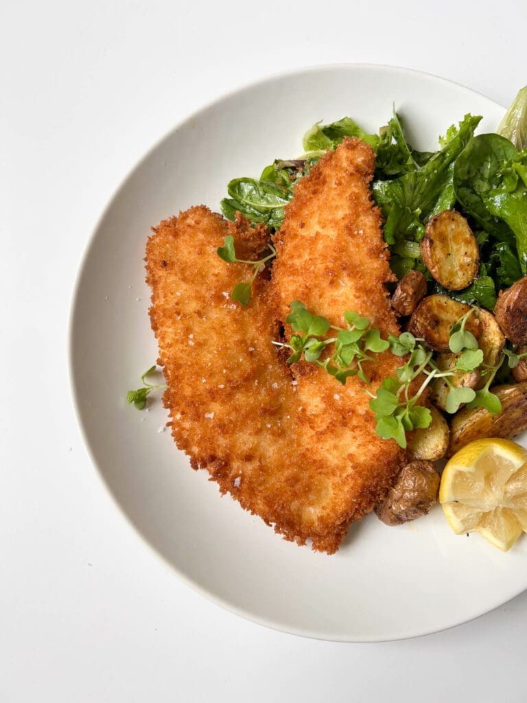 Crispy Chicken Schnitzel, Roasted Potatoes, and Mixed Greens