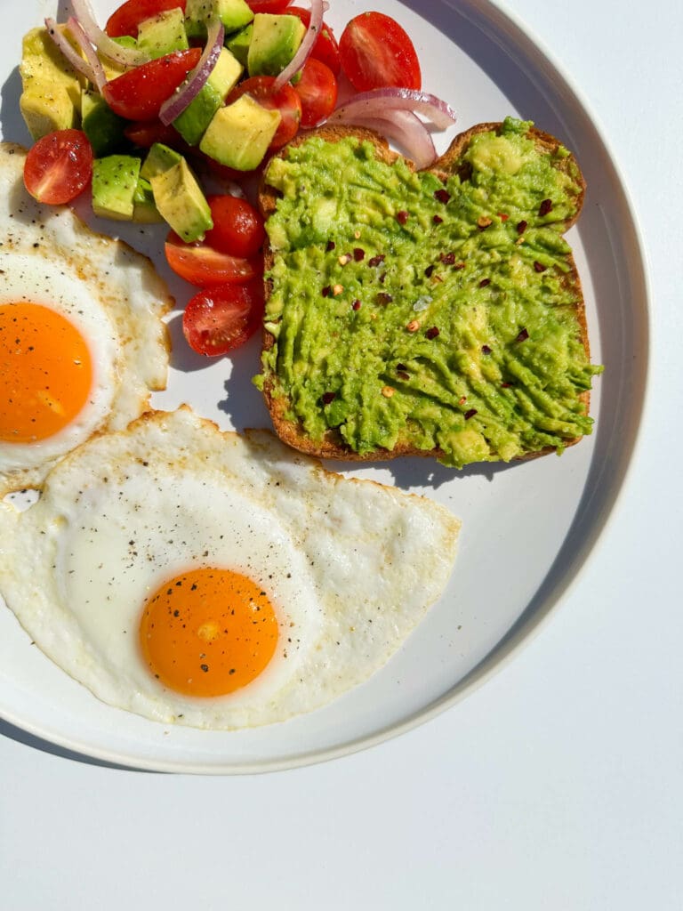 Egg Avocado Toast and Tomato Salad Breakfast Plate
